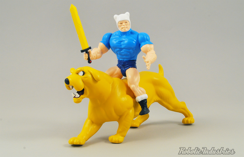Illustration for article titled A He-Finn Figure Will Make You Want a He-Man and Adventure Time Cartoon Mashup Too